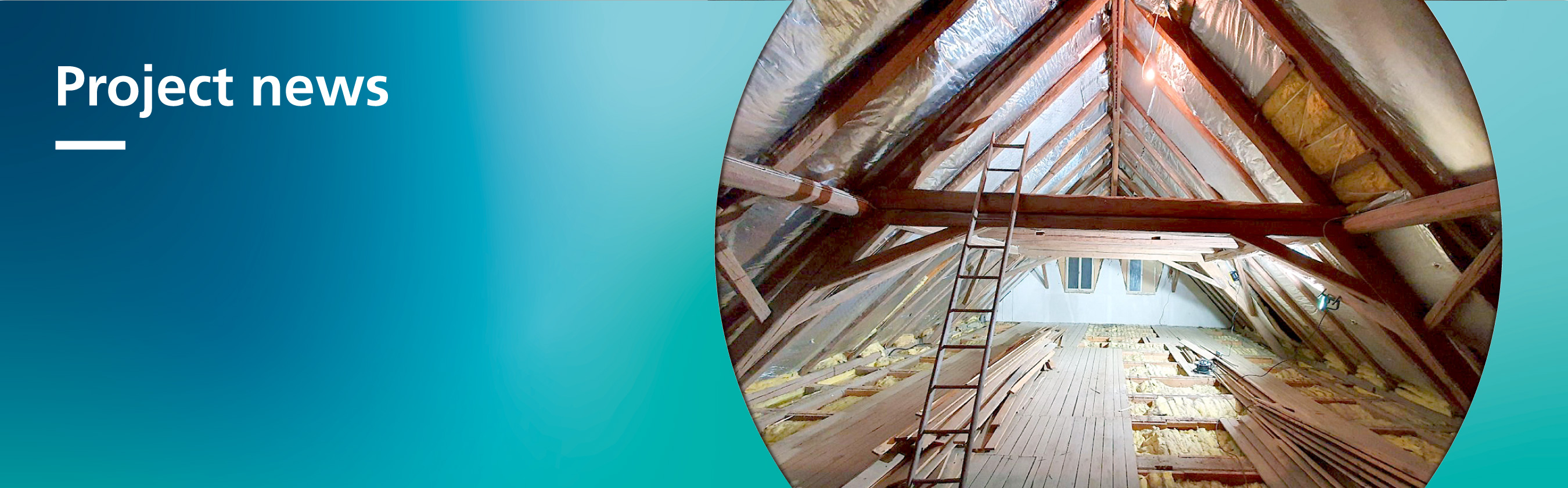The photo shows the interior view of a roof truss with exposed, dark-brown wooden beams.