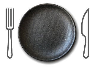 The picture shows in the center a plate made of a dark brown material. Next to it lies drawn silverware.